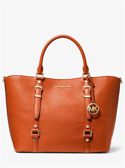 michael kors tote brown and orange|Michael Kors brown leather backpack.